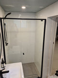 Wall to wall semi-frame shower screen with matt black aluminium frame